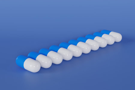 3D Rendering medicine arranged in a row on blue backgroundの写真素材
