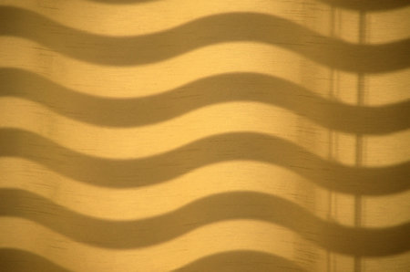 Shadow waves on a curtainの写真素材