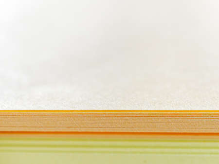A close view of a stack of colored paper for recordings. Abstract background. Copy space.の写真素材