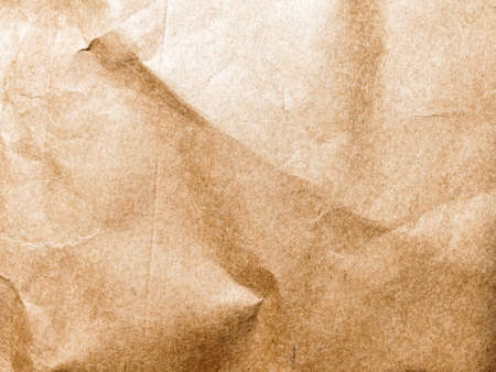 Crumpled craft paper. Template for wrapping gifts, goods, letters, correspondence. Textured background for social media, postal services, delivery services. Copy space.の写真素材