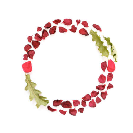 Autumn composition. The wreath is made of dried rose petals and oak leaves. Social media background. Flat lay, top view, copy space.の写真素材