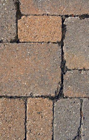 Dirty red, orange, brick ground texture, closeupの写真素材