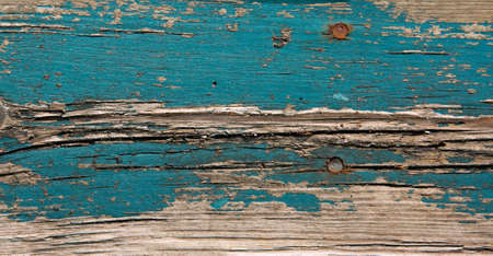 Wooden blue and beige plank texture background with rusty nailsの写真素材