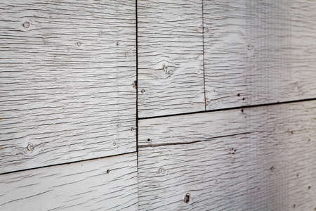 wooden board planks fence with lines, kinks, curves, texture background, rough surface