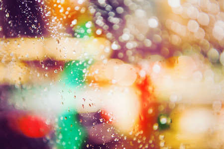 Abstract colorful blurred blurry background, warm colors tones, cinematic bokeh effect, water drops...