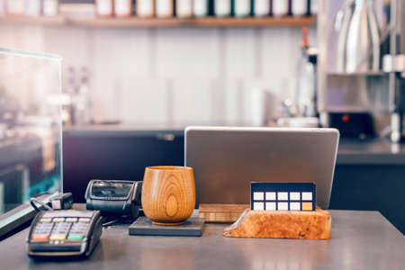 Interior design details of empty modern coffee shop restaurant at daytime. Small local business. Environment workplace of food drink server.の写真素材