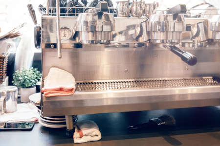 Professional coffee maker. Interior details of food shop restaurant. Hot drink machine in cafe....