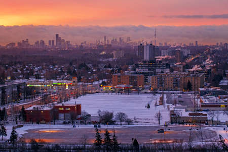Toronto, Ontario, Canada - January 9, 2020: Aerial top view of morning winter landscape in Toronto city, Canada. Canadian urban downtown or residential area at sunrise.の写真素材