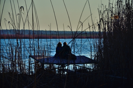 Love couple on the riverの写真素材