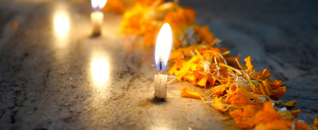 Single Candle Blowing, Decorated with marigold Flowers for celebrating festival