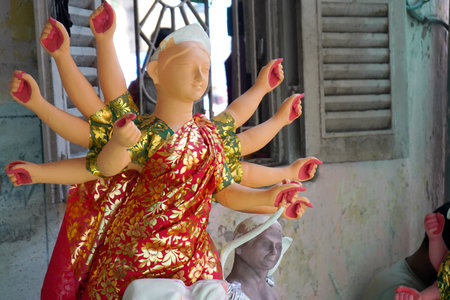 Close-Up of Partially Decorated Durga Idol in Artisan Workshop at Kumartuli Kolkataの写真素材