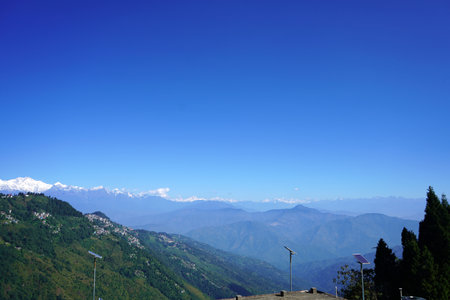 Sweeping Himalayan Vista with Snow Peaks and Clear Blue Skyの写真素材