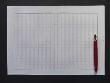 squared  Japanese  manuscript paper and afountain penの写真素材