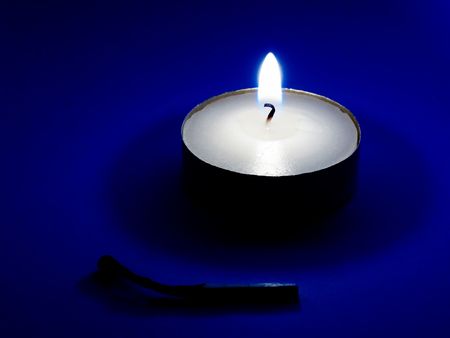 candles on a blue backgroundの写真素材