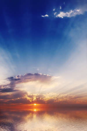 The quiet sea on a background of a beautiful sunsetの写真素材