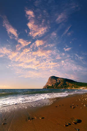 Seacoast on a background of beautiful sunriseの写真素材