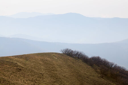 view of the mountains at sunsetの写真素材