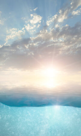 sunset on the sea and under waterの写真素材