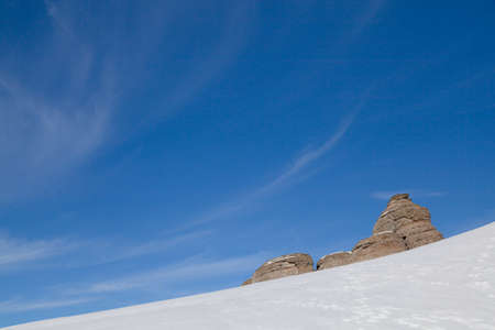 Winter mountain landscape with cloudsの写真素材