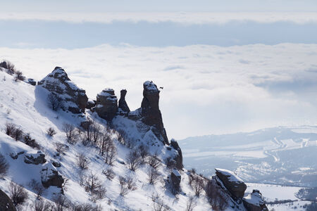 Winter scenery with mountains and a clouds.の写真素材