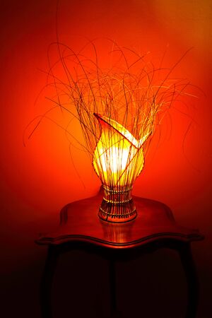 Creative lamp looking a flower ligths up the room with hot colorsの写真素材