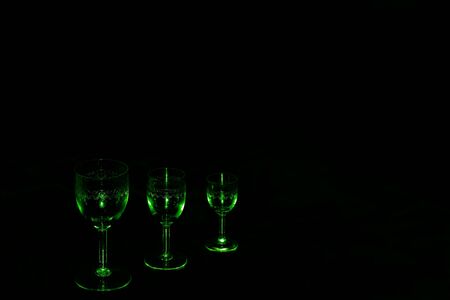 Three different size glasses in the black backgroundの写真素材