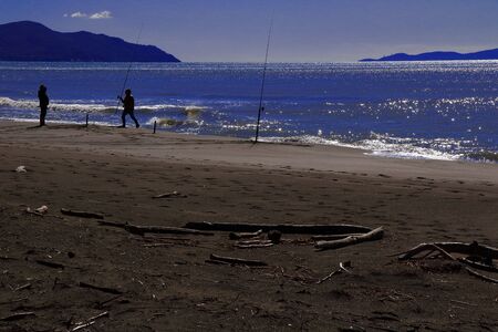 Fishing day by seaside - Maremma Regional Park - Tuscany - Italyの写真素材