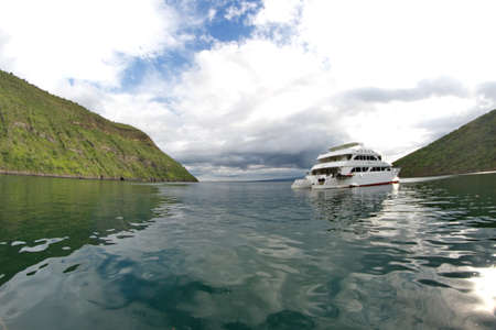 Galapagos cruise catamaran in Tagus Cove on Isabela Island, Galapagos, Ecuadorのeditorial素材
