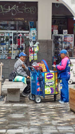 Ice cream vendor on a street in Cuenca, Ecuadorのeditorial素材