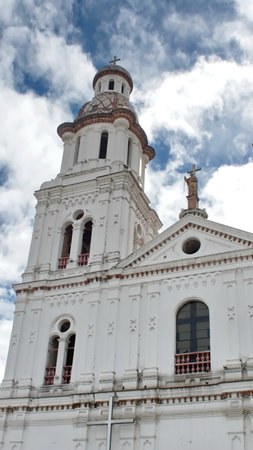 Front facade of a church in the Old Town, Cuenca, Ecuadorの写真素材