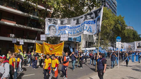 Crowds of people marking with colorful political and trade organization  banners on the Day of Remembrance in Buenos Aires, Argentinaのeditorial素材