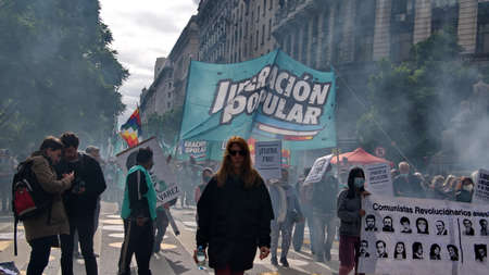Crowds of people marking with colorful political and trade organization  banners on the Day of Remembrance in Buenos Aires, Argentinaのeditorial素材