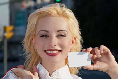 Woman with blank businesscardの写真素材