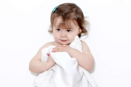 bright  portrait little girl with towelの写真素材