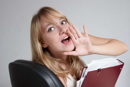 The young girl at office. Emotionsの写真素材