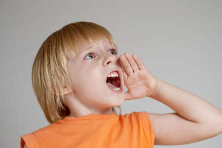The shouting emotional boy. Children's emotionsの写真素材