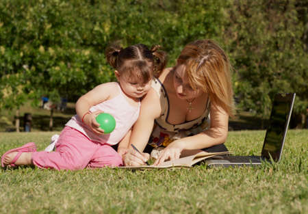 The training daughter to write motherの写真素材