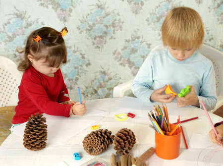 Little friends at a drawing lessonの写真素材