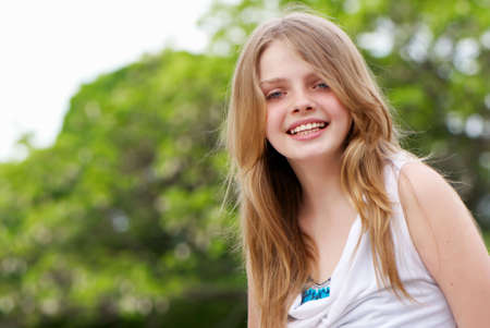 Natural young girl in the countryside portraitの写真素材
