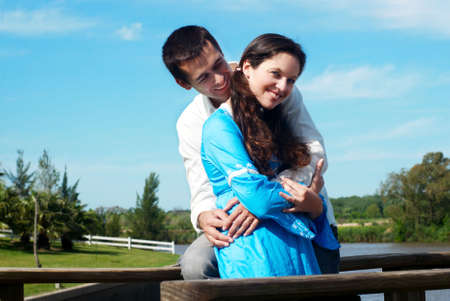 Young couple playing around in the nature