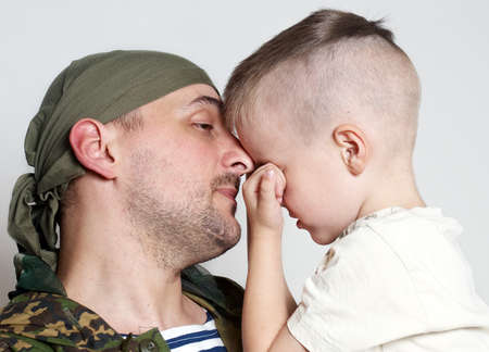Sad scene farewell of the son to father leaving on military serviceの写真素材