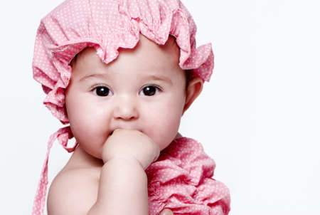 Little girl a on white background. Portrait の写真素材