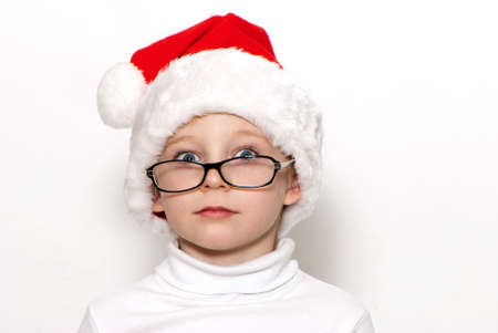 Little Santa Claus on a light background の写真素材