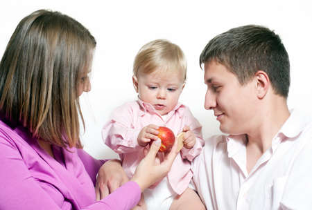 happy young family on the white の写真素材