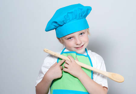 Child as a chef cookの写真素材