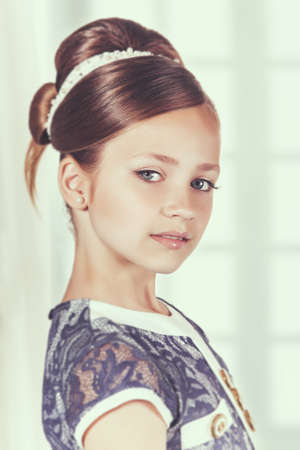 Portrait of a little fashion kid girlの写真素材