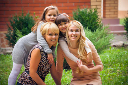 happy family in gardenの写真素材