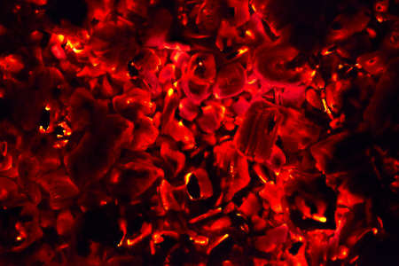 Decaying coals for cooking and a background Decaying coals for cooking and a backgroundの写真素材