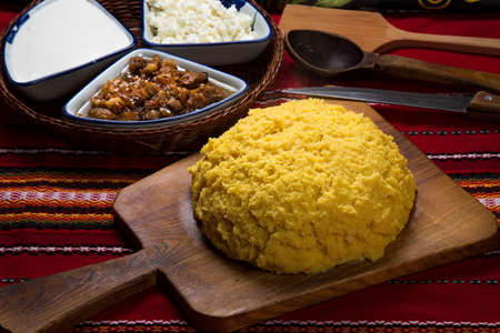 Hominy on a wooden plank.