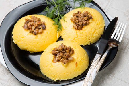 Mamaliga with cracklings on a plate.の写真素材